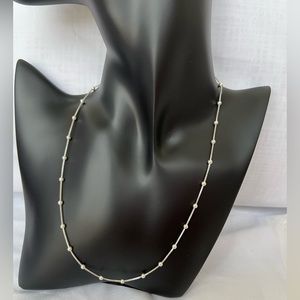 silver necklace with balls